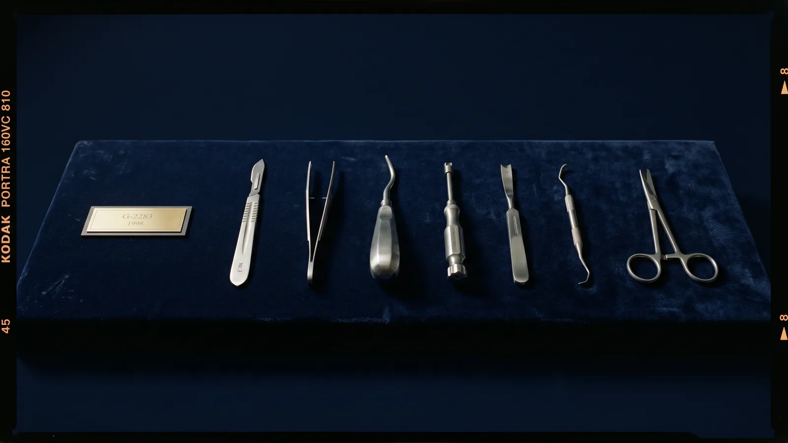 Surgical steel implant instruments arranged like museum artifacts